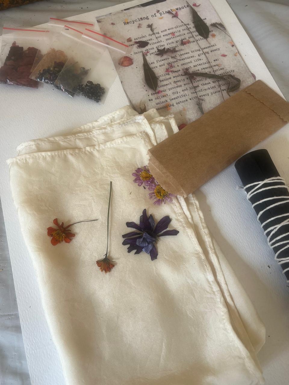 A KAIA botanical print kit with prepared cloth, dye plant packets, twine and an info sheet