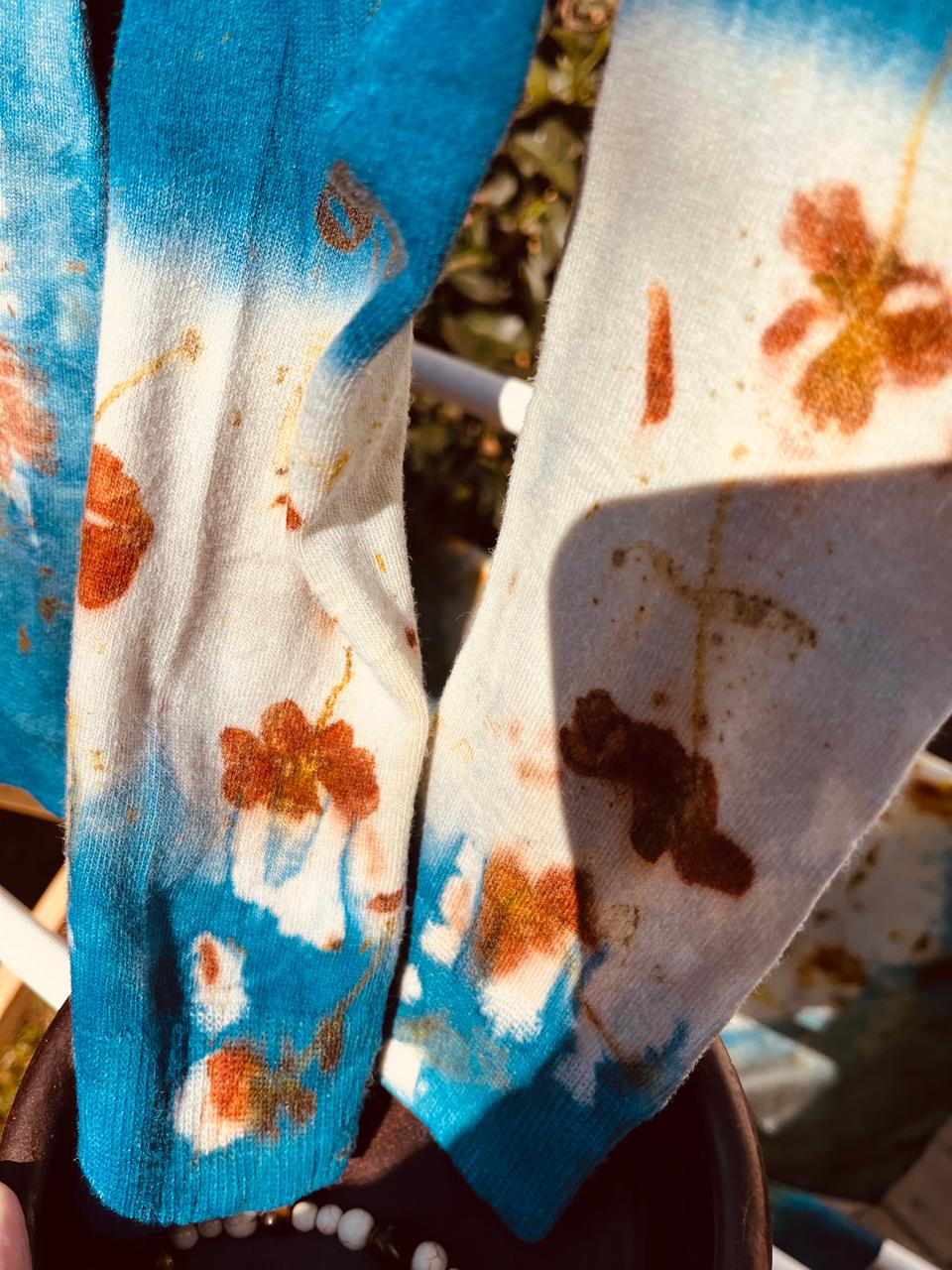Indigo dip-dyed cotton socks with orange botanical leaf prints